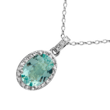 Oval Apatite Halo Pendant.