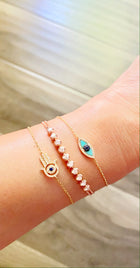 Diamond Charm Strand Bracelet.