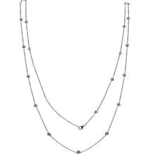 Extra Long Diamond Strand Necklace.
