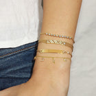 Diamond Charm Strand Bracelet.