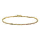 Half Emerald Diamond Crown Prong Tennis Bracelet.